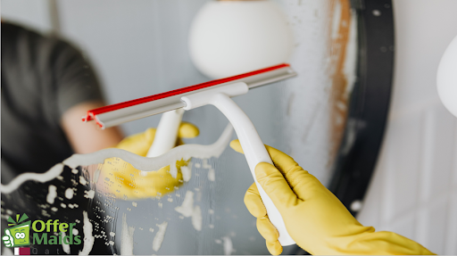 cleaning mirror with a squeegee